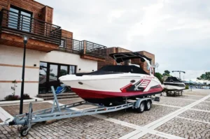 Motor boat on a trailer for road transport — boat as cargo