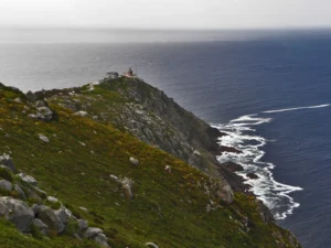 Cape Finisterre lighthouse on the Galician coast at the end of a Bay of Biscay crossing