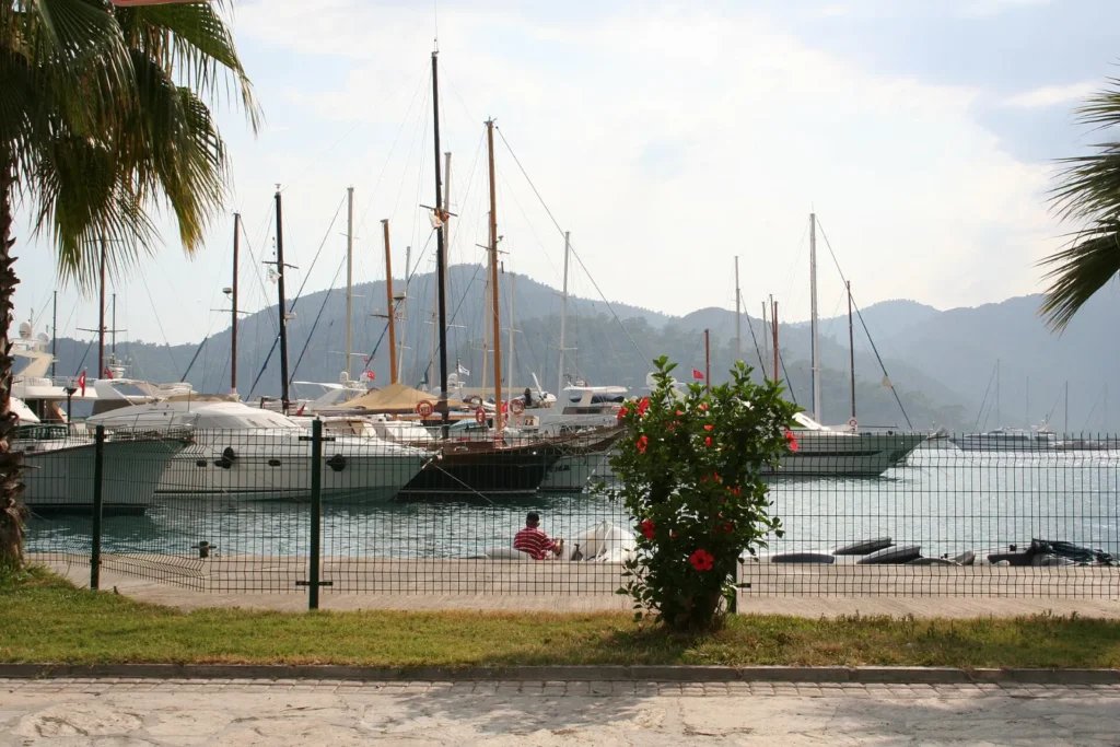 Sailing yachts and motor yachts in the harbour at Göcek, south-west Turkey