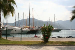 Sailing yachts and motor yachts in the harbour at Göcek, south-west Turkey