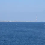 The Strait of Messina seen from Capo Peloro, Sicily, with the Calabrian coast beyond