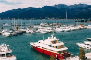 Yachts moored at the pier in Porto Montenegro marina